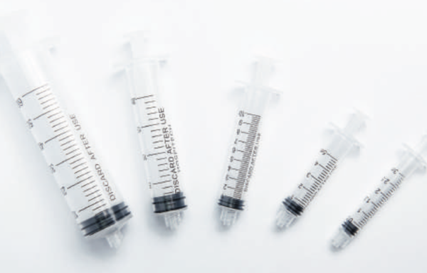 DISPOSABLE SYRINGE